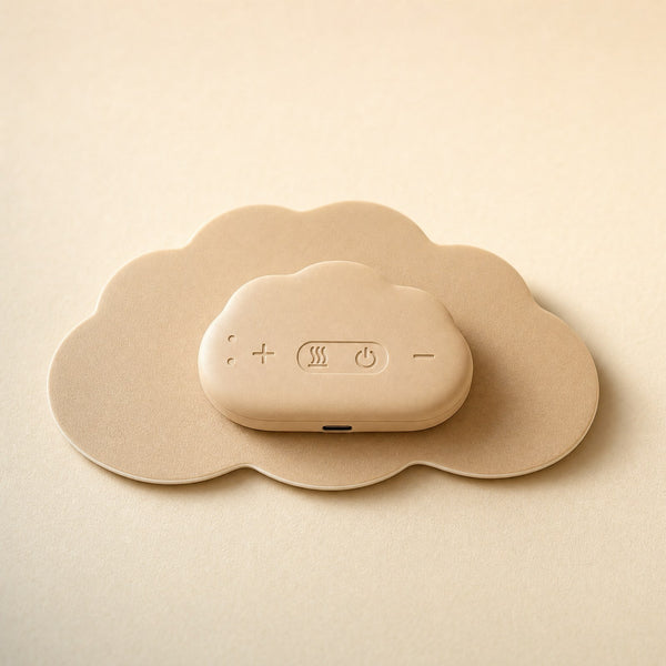 The Velarle patch, assembled: a wide cloud-shaped gel pad with the control unit clipped on